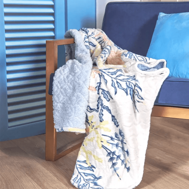 MANTA-FLANNEL-OVEJERO-120x145-ALGAS-AZUL-MAYA-7702997612251