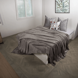Cobija flannel unicolor gris piedra
